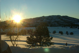 A sunrise over a winter mountain. 